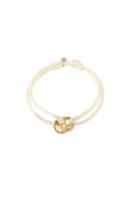 Verstelbare armband met goudkleurig stainless steel knoopdetail