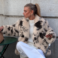 Molly Cow Fur Jacket - faux fur jas met cow print, luxe statement piece voor het najaar